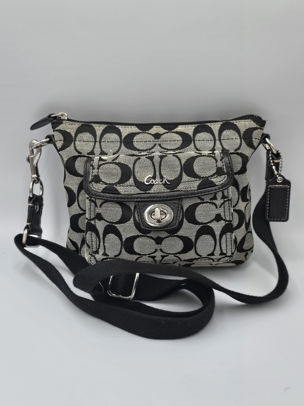 COACH Signature Penelope Turnlock Swingpack Small Crossbody Messenger Bag Black